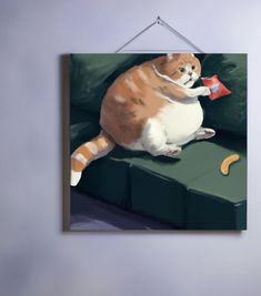 an orange and white cat sitting on top of a green couch