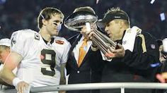 two football players are holding trophies and confetti