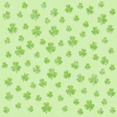 green shamrocks on a light green background for st patrick's day wallpaper