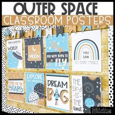 a bulletin board with posters on it and the words outer space classroom posters hanging up