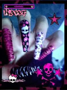 a person with pink and black nail polish on their nails, holding a skull and crossbone