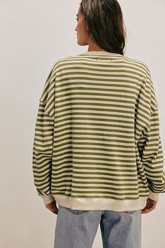 So cool and classic, this timeless crewneck is featured in an oversized, slouchy silhouette and staple striped print with contrasting hems for added dimension. **Fit:** Relaxed, oversized fit **Features:** Crew neckline, dropped shoulders, contrast hems **Why We | Classic Striped Oversized Crewneck by We The Free at Free People in Green, Size: S Free People Striped Sweater, Free People Clothes, Lucy Loo, Striped Sweater Outfit, Cute Winter Sweaters, Spring Sweaters, Oversized Striped Sweater, Winter Wishlist, Striped Crewneck