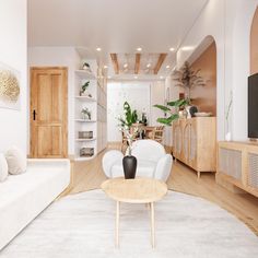 a living room filled with furniture and a white rug