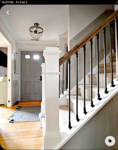 the stairs in this house are painted white