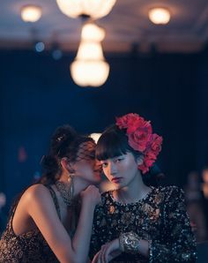 two young women standing next to each other