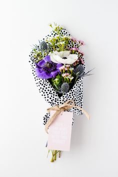 a bunch of flowers that are on top of a white wall with the words 5 ideas