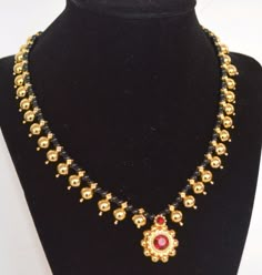 KOPM - Long Mangalsutra with black beads and round pendant Black Beads With Kasu, Old Gold Jewelry Indian, Black Thread Jewellery Indian, South Asian Jewelry, Long Mangalsutra, Chantilly Virginia, Hindu Jewelry, Designer Jewelery, Gold Jewelry Prom