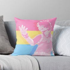 a throw pillow sitting on top of a couch