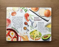 an illustrated recipe book on a wooden table