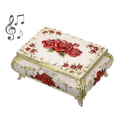 a white box with red roses and musical notes