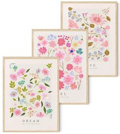 three framed art prints with flowers and leaves on them, one in pink, the other in blue