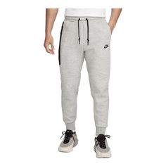 Nike Sportswear Tech Fleece Sweatpants Asia Sizing 'Grey' FB8003-063 Gray Sportswear Bottoms For Training, Nike Gray Activewear For Winter, Nike Joggers For Winter Sports, Nike Winter Joggers For Sports, Winter Nike Joggers For Sports, Gray Fleece Activewear For Sports Season, Gray Sporty Bottoms For Winter, Nike Gray Winter Activewear, Nike Winter Sports Joggers