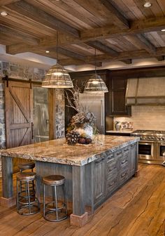 an image of a kitchen with wood floors and granite counter tops on the phone screen