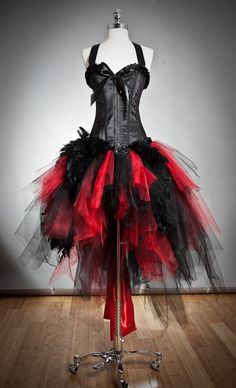 a black and red corset dress on a mannequin