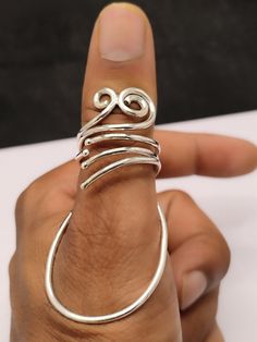 About item Item :- MCP Joint Ring Ring size :- Chose from variation (Custom size accepted) Material  :- 925 Sterling silver Purity  :- 92.5 Title:-Thumb Splint MCP 925 Silver Ring, MCP Hyperextension Splint, Arthritis Rings, MCP joint support Thumb Ring,Splint Finger For All Joints Ring, EDS Splint ring, Grandma Gift Description:- We use 925 sterling silver to making jewelry. We accept all types of custom & personalized order. Please send us a message if you are interested in a custom creation. Mcp Ring Splint, Adjustable Sterling Silver Ring With Unique Design, Adjustable Spiral Midi Rings In Silver, Adjustable Spiral Silver Midi Rings, Adjustable Silver Spiral Midi Rings, Silver Spiritual Open Midi Rings, Spiritual Silver Open Midi Rings, Adjustable Sterling Silver Fusion Rings, Adjustable Fusion Style Sterling Silver Rings