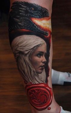 a woman with a snake on her head is shown in this tattoo