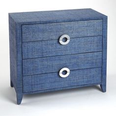 a blue dresser with two drawers on each side