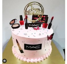 a birthday cake with makeup and lipstick on it