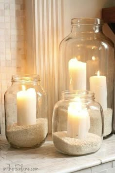 an image of candles in glass jars on the web page for pinterest com