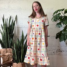 The Billie Dress is a prairie-style dress, featuring a flattering square neckline, short sleeves, loose fit, and the perfect length. Its airy fit mixed with the bold bright print makes it a comfortable everyday statement piece that can be dressed up or dressed down for any occasion. Hand sewn 100% Linen Cotton Printed with high-quality eco-friendly ink ***PLEASE READ BEFORE PURCHASE*** Please note that this garment is made to order, and production times can take up to two months. We recommend ch Linen Summer Dress, Teacher Dresses, Linen Summer, Summer Linen Dresses, Prairie Style, Prairie Dress, Dressed Down, Dress Clothes For Women, Fruit Salad