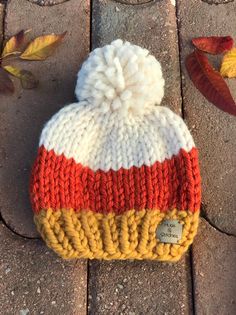 Hand knit candy corn theme baby beanie! Perfect for the October gift for new Mommy, baby shower, or your new little one! Can be used for either girl or boy! Perfect photo prop! *Best to hand wash and lay flat to dry to keep looking the nicest.  * message me if looking for other colors for gift ideas! Candy Corn Costume, October Gifts, Baby First Halloween, Newborn Baby Hats, Baby Hats Knitting, Baby Trend, Newborn Hat, Winter Baby, Fall Baby