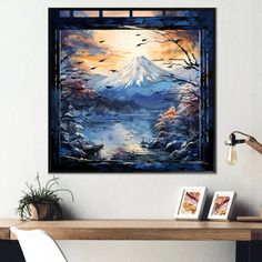 a painting hanging on the wall above a desk