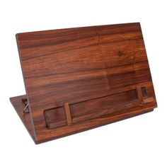 a wooden business card holder on a white background