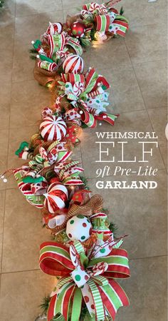 christmas decorations on the floor with words that read, whimsical elf pre - lit garland