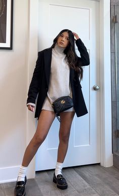 Oversized mock neck sweater in taupe, oversized black blazer, chunky knit socks, black and brown loafers, winter outfit, petite fashion, chic style Blazer Loafers Outfit Women, Sweater Dress Loafers, Loafers And Sweater Outfit, Oversized Blazer And Loafers, Mid Size Loafers Outfit, Sweater Dress And Loafers Outfit, Black Wool Sweater Outfit, Fall Winter Mom Outfits, Gucci Loafers With Socks