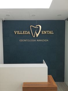 the front entrance to villa dental, located in an office building with stairs leading up to it