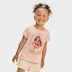 Set them up for another adventure-filled day in this Disney Moana Short-Sleeve Graphic T-Shirt. Crafted from midweight jersey fabric and featuring a tagless design, this short-sleeve T-shirt offers them all-day comfort, while the below-waist length gives them the option of wearing it tucked in or untucked. Designed in a coral pink hue, this crewneck tee features a Moana graphic on the front with colorful tropical flower graphics under it and the caption that reads "Go with the Flow" around it fo Flower Graphics, Disney Toddler, Disney Moana, Go With The Flow, Tropical Flower, Fabric Tape, Disney Girls, Cute Disney, Cute Tshirts