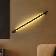 The Linea Wood Wall Light is a minimalist lighting fixture designed with sleek, linear aesthetics in mind. Its slender, elongated form exudes elegance and simplicity, making it a perfect choice for modern and contemporary interiors. Crafted from premium materials, the light offers a soft, diffused glow that enhances the ambiance of any room without overpowering the space. Ideal for hallways, living rooms, or bedrooms, the Linea Wall Light seamlessly blends functionality with a refined, understat Wood Wall Light, Minimalist Lighting, Contemporary Interiors, Contemporary Interior, Light Switch, Wood Colors, Warm Light, Wood Wall, Wall Light