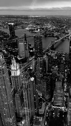 black and white photograph of new york city at night