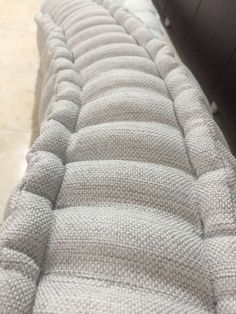 an up close shot of the back end of a couch