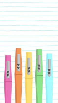 four different colored pens lined up next to each other on top of lined notebook paper