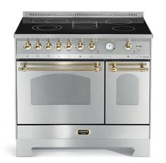 a silver stove with two ovens and gold trimmings on the top, against a white background