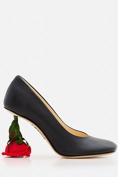 STEP INTO ROMANCE WITH LOEWE 90MM DECOLLETE' TOY ROSE Add a touch of whimsy to your footwear collection with the stunning Loewe 90mm Decollete' Toy Rose. Featuring a unique rose heel, these elegant black pumps are the perfect blend of sophistication and playful design. Ideal for any special occasion, they promise to elevate your style and turn heads wherever you go. Shop now on Italist and bloom in style! Click the link. Footwear Collection, Sneaker Wedge, Yoga Wear, Black Pumps, Playful Design, Manolo Blahnik