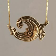 Ride the Wave, wearing this fluid and powerful Rip Curl Wave pendant! The piece is cast in solid 14k Gold, is 1 1/2" across and sculpted carefully all around. My inspirations in creating this design were many. First of all I love to design abstract and fluid pieces with obvious Art Nouveau influences. Secondly, my studio is in Santa Cruz, with many legendary surf spots nearby and finally, I love and admire the iconic Japenese wood block prints of the "Great Wave." This item usually ships the sam Luxury Swirl Jewelry Gift, Luxury Gold Wavy Jewelry, Ocean Tide Jewelry, Luxury Swirl Jewelry For Gifts, Wave Jewelry Surfgirl, Wave Jewelry Box, Wave Box Jewelry, Luxury Etched Artistic Jewelry, Luxury Artistic Etched Jewelry