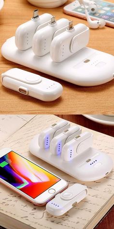 an iphone charging station with four chargers attached to it