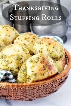 a basket filled with baked scallops and the words thanksgiving stuffing rolls in front of it