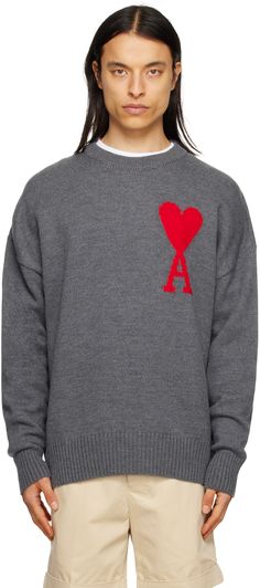 Knit wool sweater. · Rib knit crewneck, hem, and cuffs · Intarsia logo at chest Supplier color: Heather grey/Red Paris Clothing, Red Panels, Chunky Knit Jumper, Paris Grey, Ami Paris, Knit Crewneck, Sweaters Knitwear, Accessories For Men, Curator Style