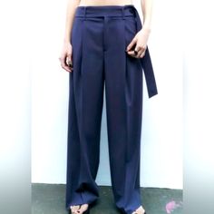 Zara Nwt Limited Edition Pleated Wide Leg Trousers In Navy New, Never Worn Mid-Rise Pleated Pants With Belt Loops At Waist. Side Pockets And Back Welt Pockets. Adjustable Removable Self Belt With Button. Front Zip, Button, And Metal Hook Closure Belt Is Removable Gorgeous Pants With A Wonderful Drape, Perfect For Any Season. Pants With Belt, Zara Jumpsuit, Jumpsuit Trousers, Pleated Pants, Zara Pants, Navy Color, Wide Leg Trousers, Welt Pockets, Pant Jumpsuit