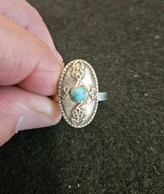 Gorgeous Sterling Silver Ring with Southwestern flair. There is a 4MM matrix Turquoise bezel set on top. Size 7.5 Southwestern Silver Turquoise Ring For Jewelry Making, Silver Oval Turquoise Ring With Concho Detail, Silver Oval Turquoise Ring With Concho, Southwestern Oval Nickel-free Jewelry, Bohemian Turquoise Jewelry With Concho, Bohemian Turquoise Concho Jewelry, Handmade Western Style Silver Turquoise Ring, Handmade Silver Turquoise Ring In Western Style, Southwestern Stamped Turquoise Ring