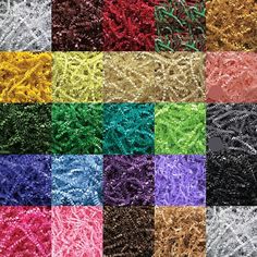 many different colors of yarn are shown in this image, including red, green, yellow and purple