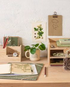 an instagram page with various items on the table, including notebooks and papers