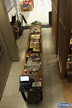 an overhead view of a buffet with food on the counter and in front of it