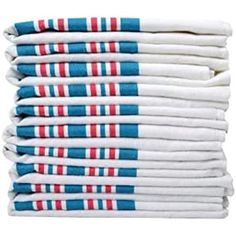 stack of folded towels with red, white and blue stripes on the bottom in front of a white background