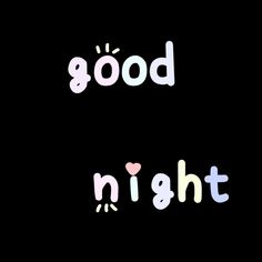 the words good and night appear to be painted in different colors on a black background