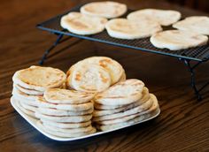 there are many pancakes on the plate and one is stacked up next to each other