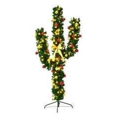 a christmas tree with lights on it and a cactus shaped like the letter y in the center